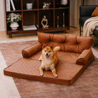 Dog resting on the cognac brown faux leather orthopedic sofa bed
