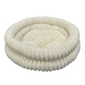 Cat curled in the PawLab DreamNest velvet donut pet bed