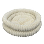 Cat curled in the PawLab DreamNest velvet donut pet bed