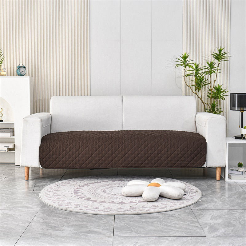 Cookie Brown lifestyle — waterproof couch mat on sofa — PawLab